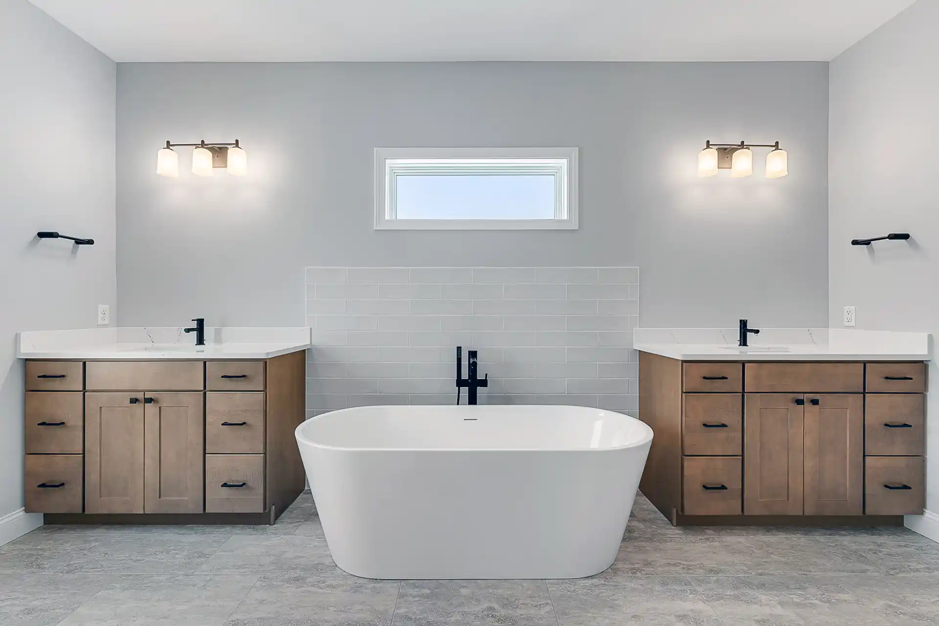 Large bathroom with two sinks and soaking tub
