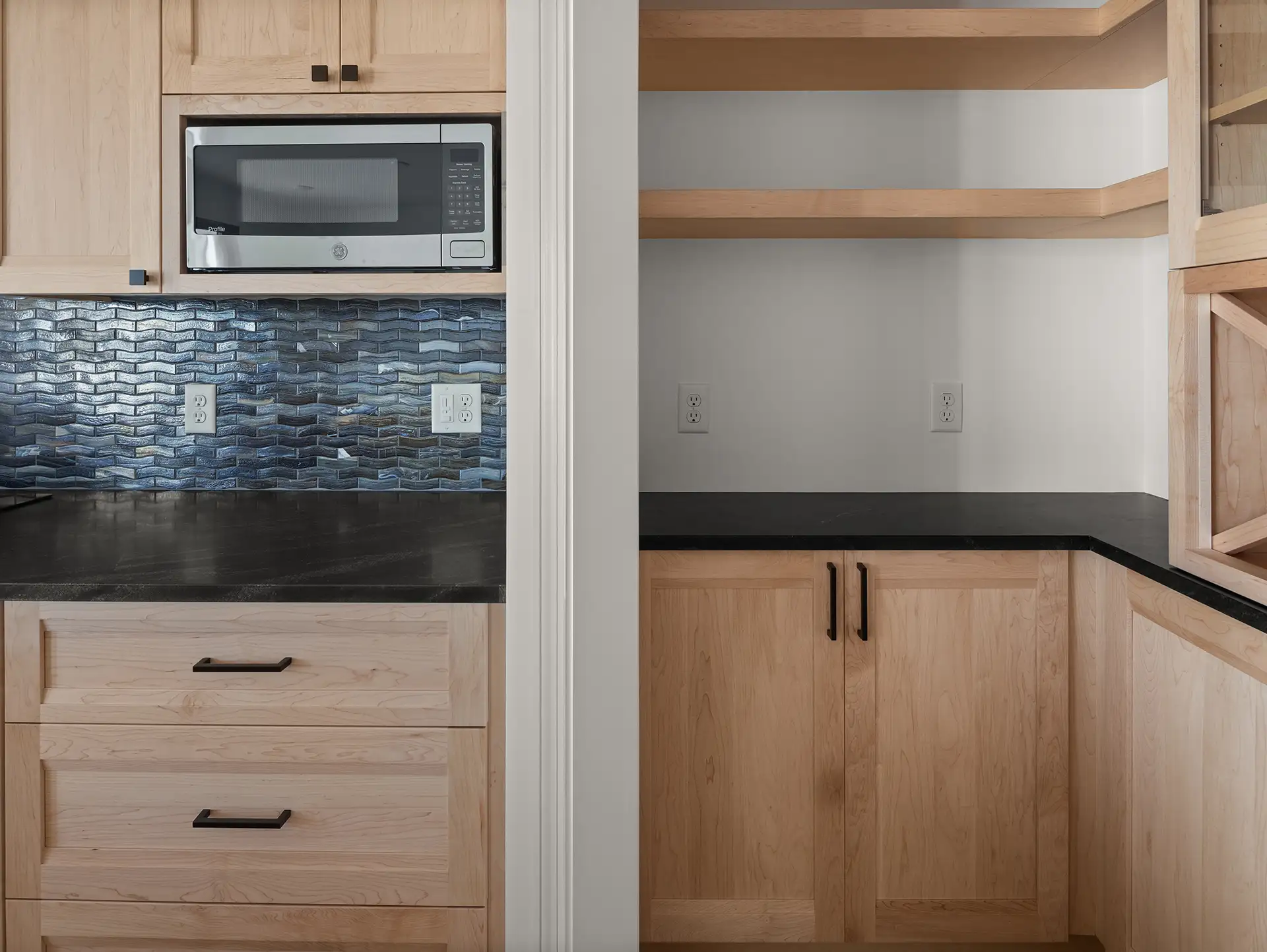 blue tile backsplash microwave built in pantry shelves closeup