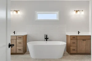 freestanding tub double vanity subway tile accent