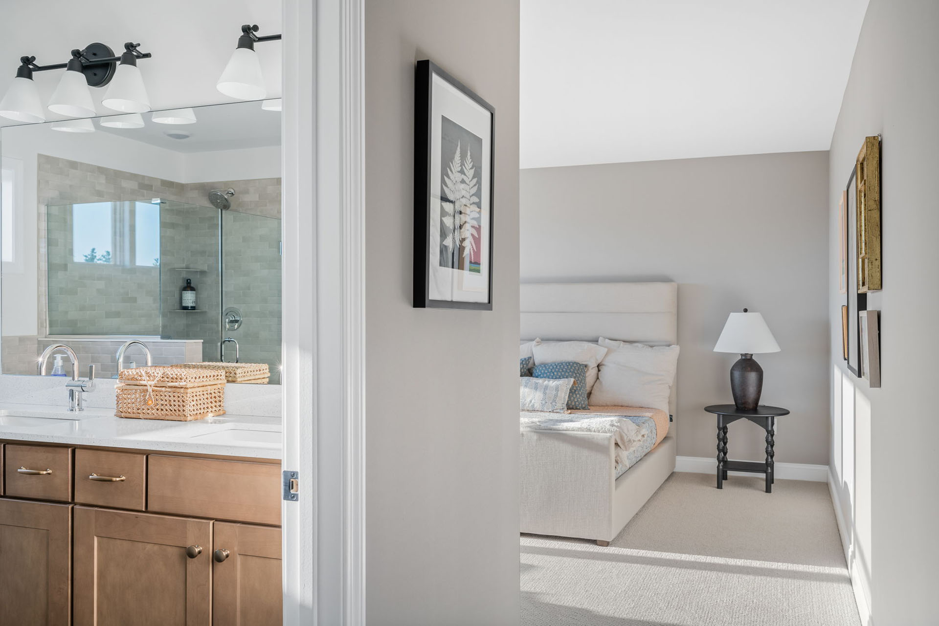 hallway view of bathroom vanity and adjacent bedroom