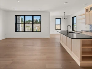 light wood kitchen island black countertop farm view