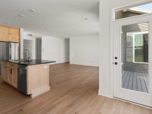 light wood kitchen island deck door open plan