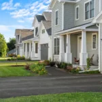 neighborhood street with craftsman homes and covered porches