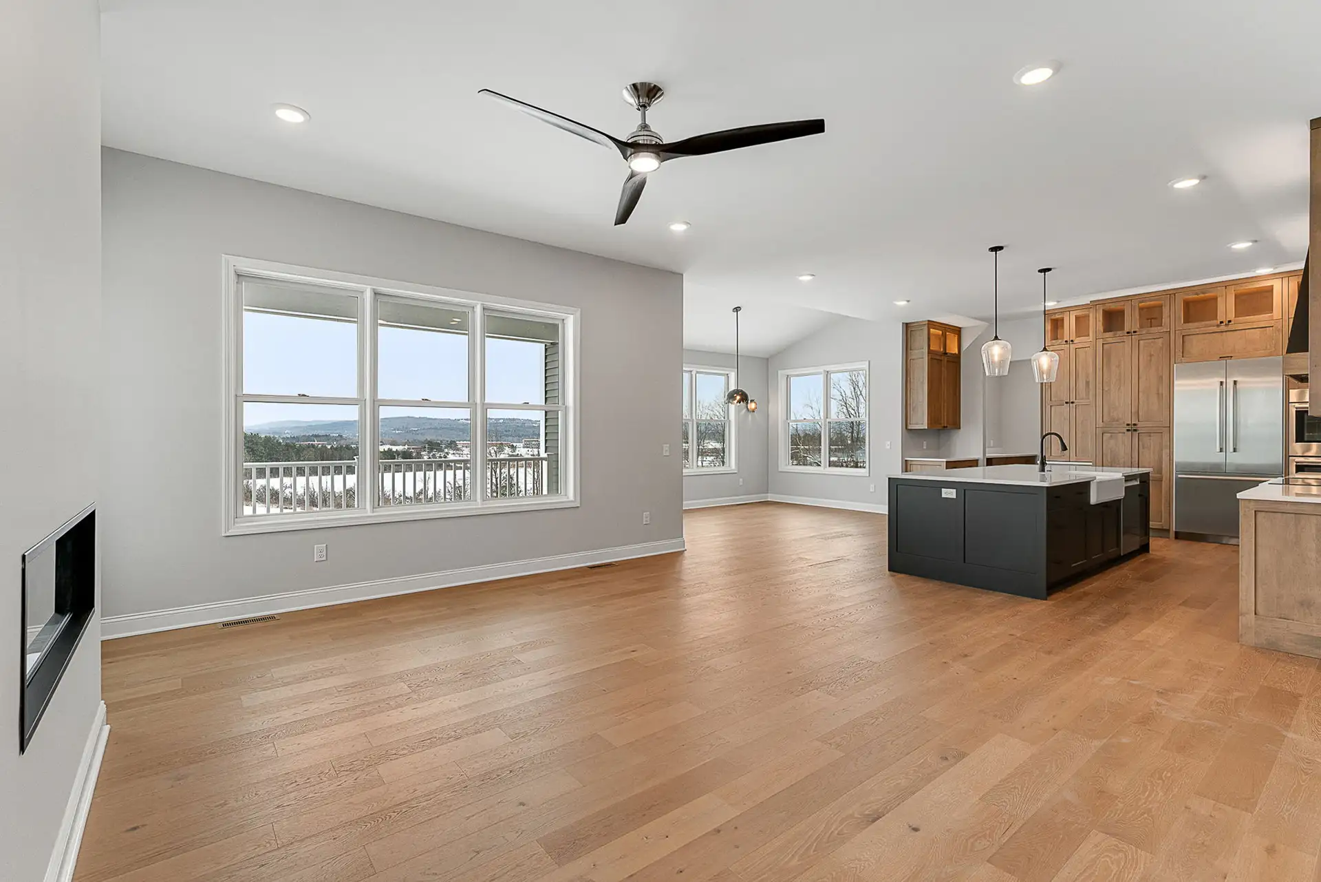 open living room ceiling fan dark island mountain view