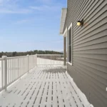 snow covered upper deck with winter landscape view