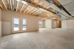 unfinished basement concrete floor french doors mountain view