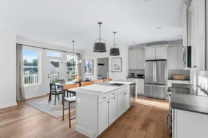 white kitchen island stainless appliances dining french doors